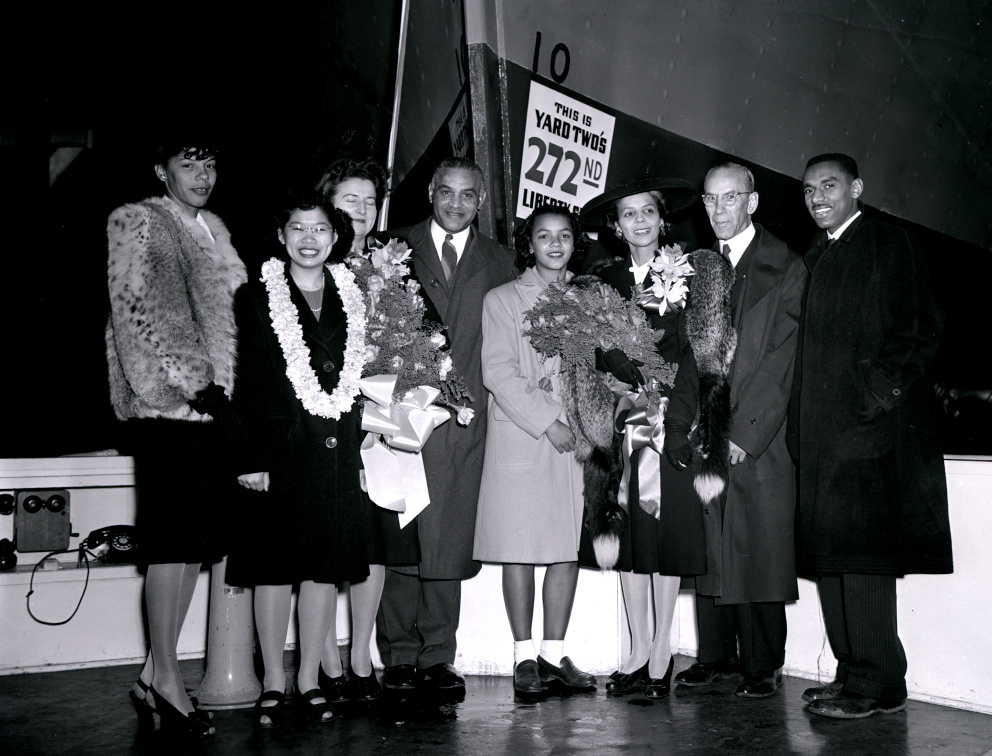 1944 image of a multicultural group of people at the launching of the Liberty ship SS John Hope.