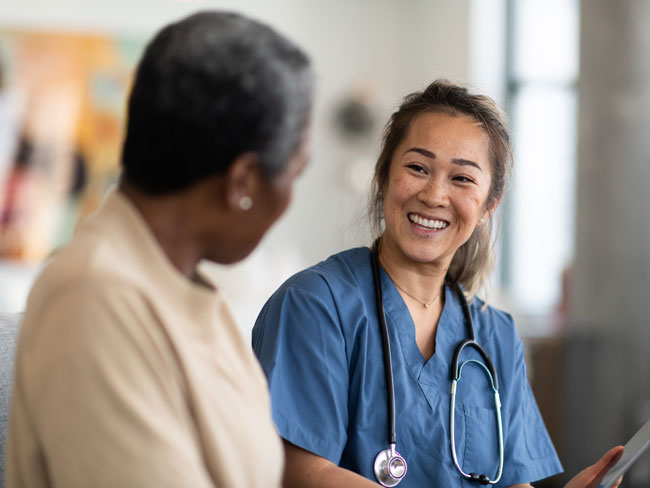 Doctor smiling at patient