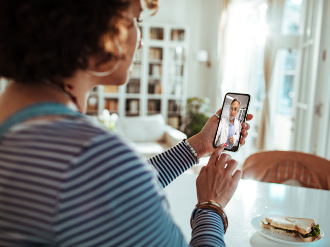 Woman on video call with doctor