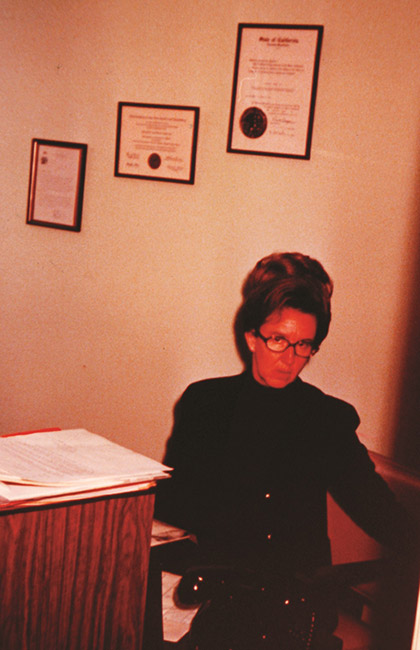 woman sitting at office desk