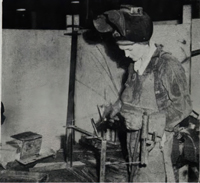 Jeanne Wilde doing welding work