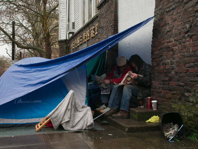 Homeless person and tent