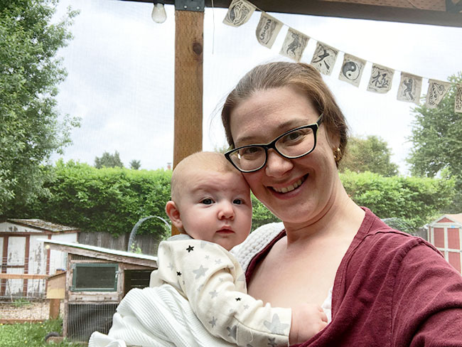 Alexia Rostow holding her baby.