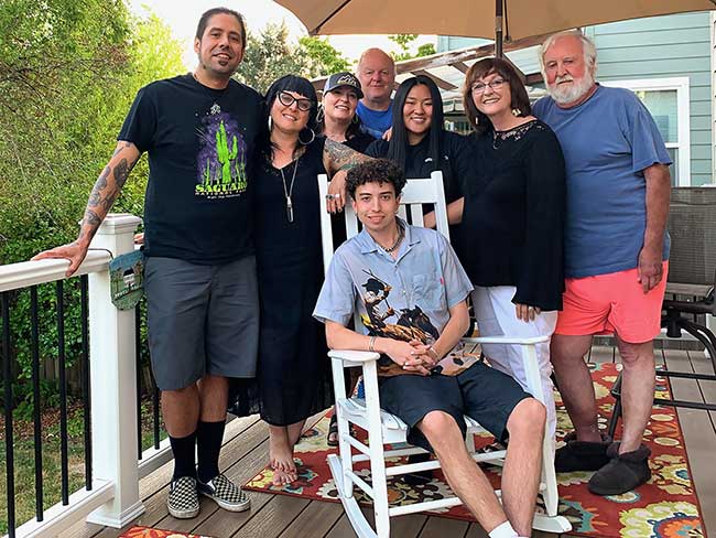 Kaiser Permanente member Eleanor Gorman, second from right,  on her back porch surrounded by her family.