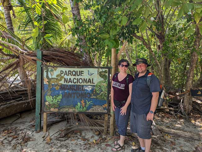 man and woman in a rainforest