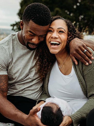 Bree with her husband, Nate, and their daughter.