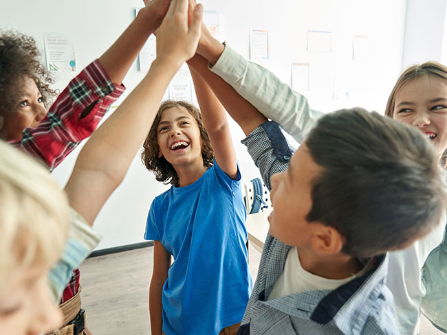 Kids high-fiving