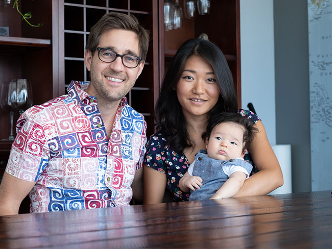 Qinwei “Vivi” Xie and Matt Kukla with their son, Kai.