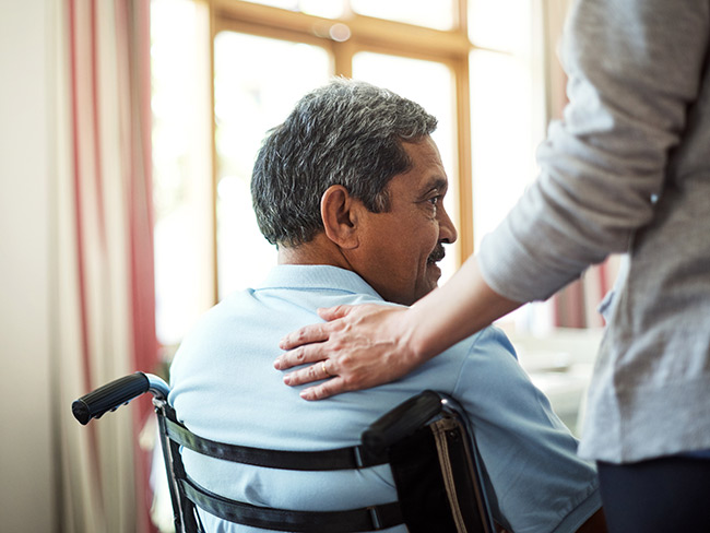 man seated in wheelchair