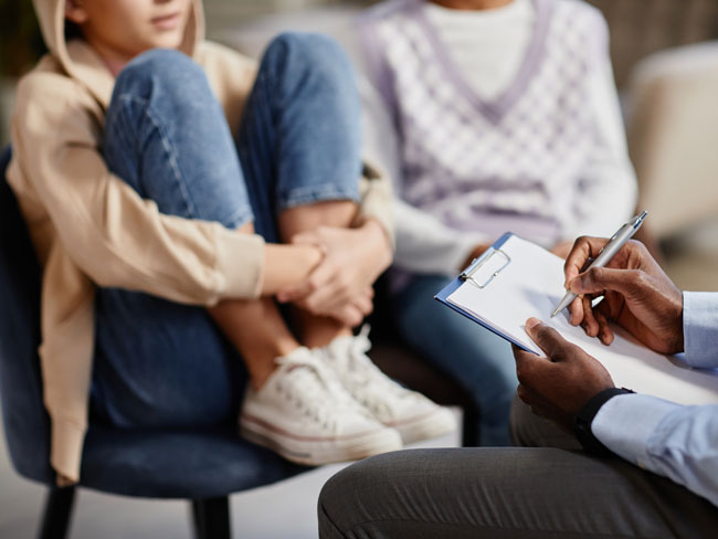 Young patient with behavioral health consultant