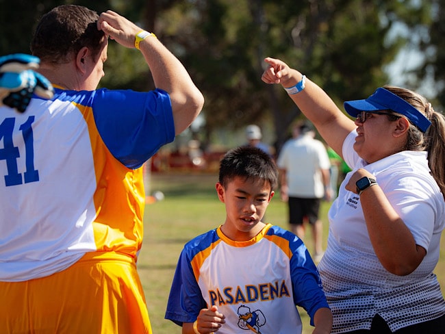 Pasadena Ducks coach Crystal Orta and member Daniel Jin