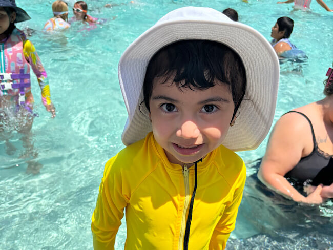 Young girl at swimming pool 