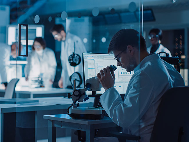 A group of diverse scientists working in a lab