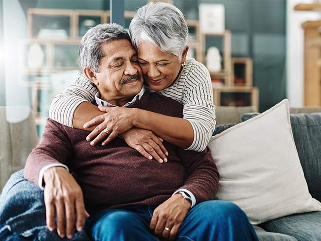 Senior couple hugging each other