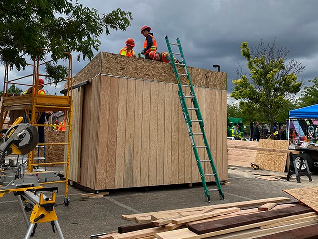 students contructing a shed