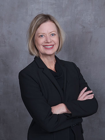 Profile picture of Dr. Tracy Lippard with her arms crossed