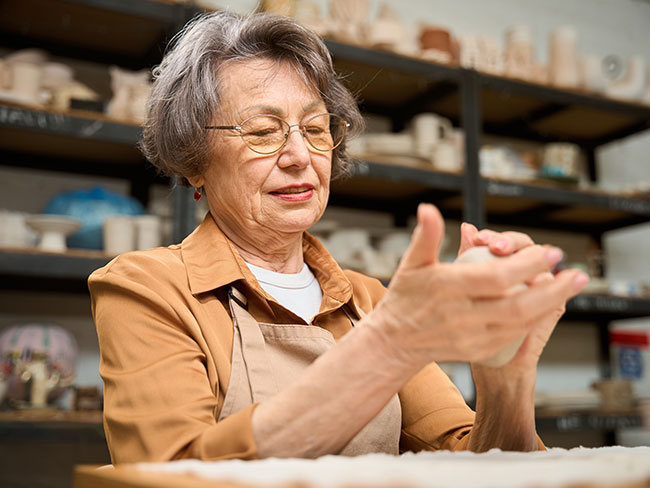 Woman working with clay