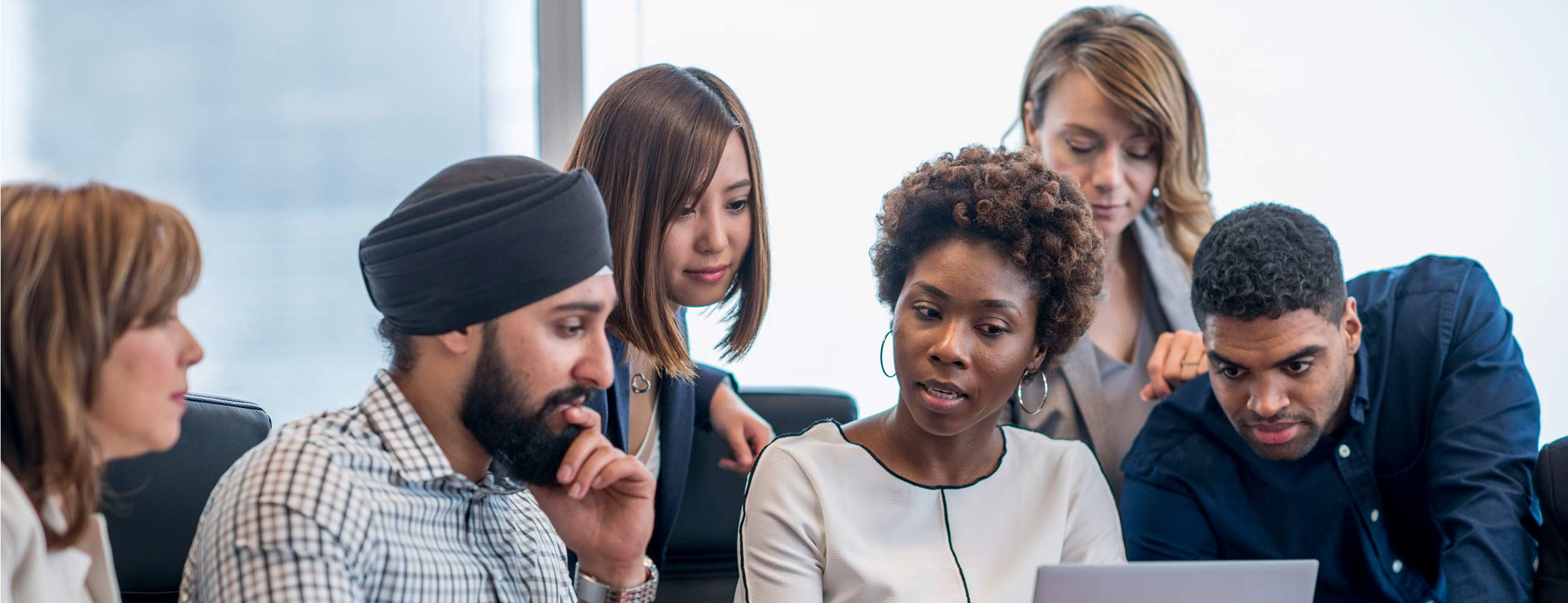 Diverse group of employees collaborating 