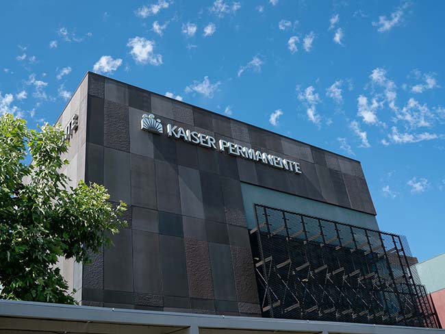 A Kaiser Permanente office building on a sunny day