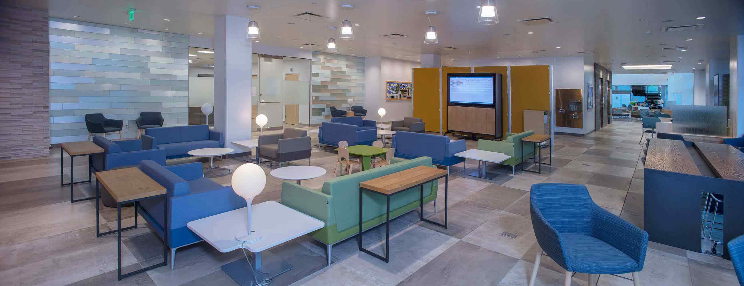 A brightly lit waiting room at a Kaiser Permanente waiting room.